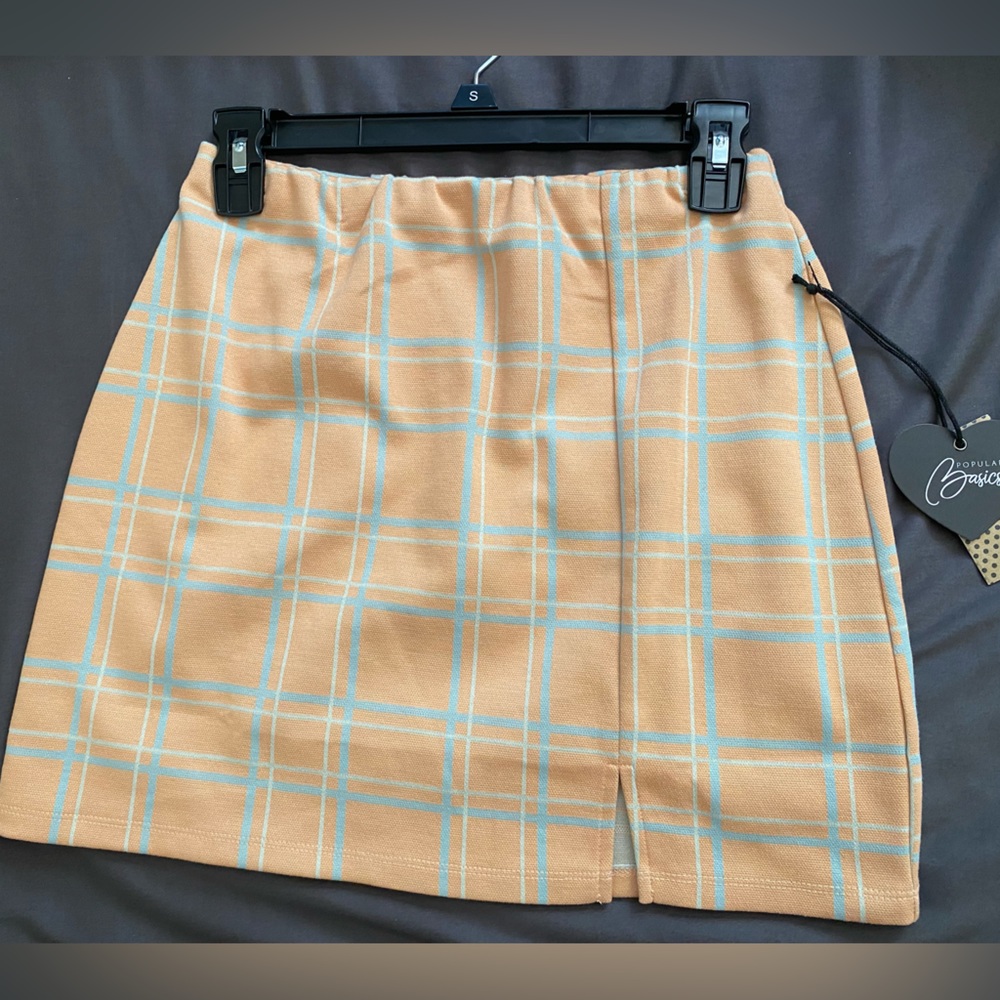 3/$20 Brand new plaid skirt. Size M juniors